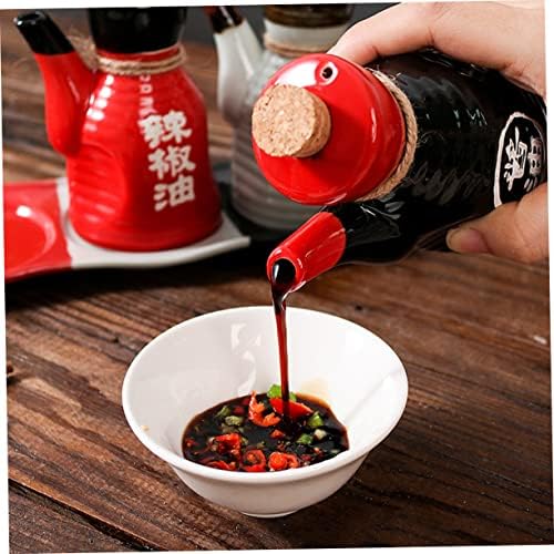 posh black sauce dispenser