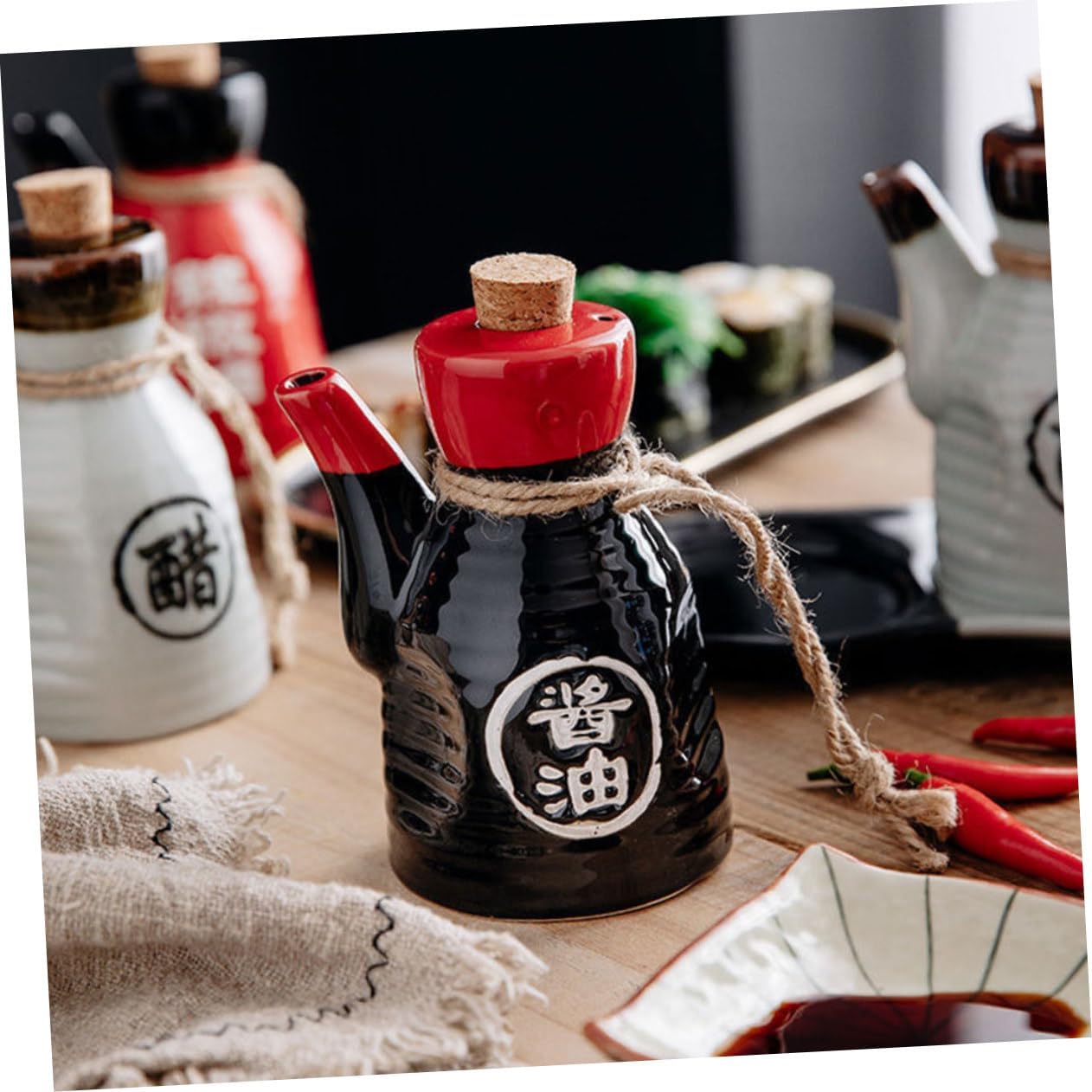 posh black sauce dispenser